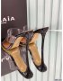 Maison Alaia Slingback Pumps