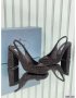 Prada Patent Stone Pumps